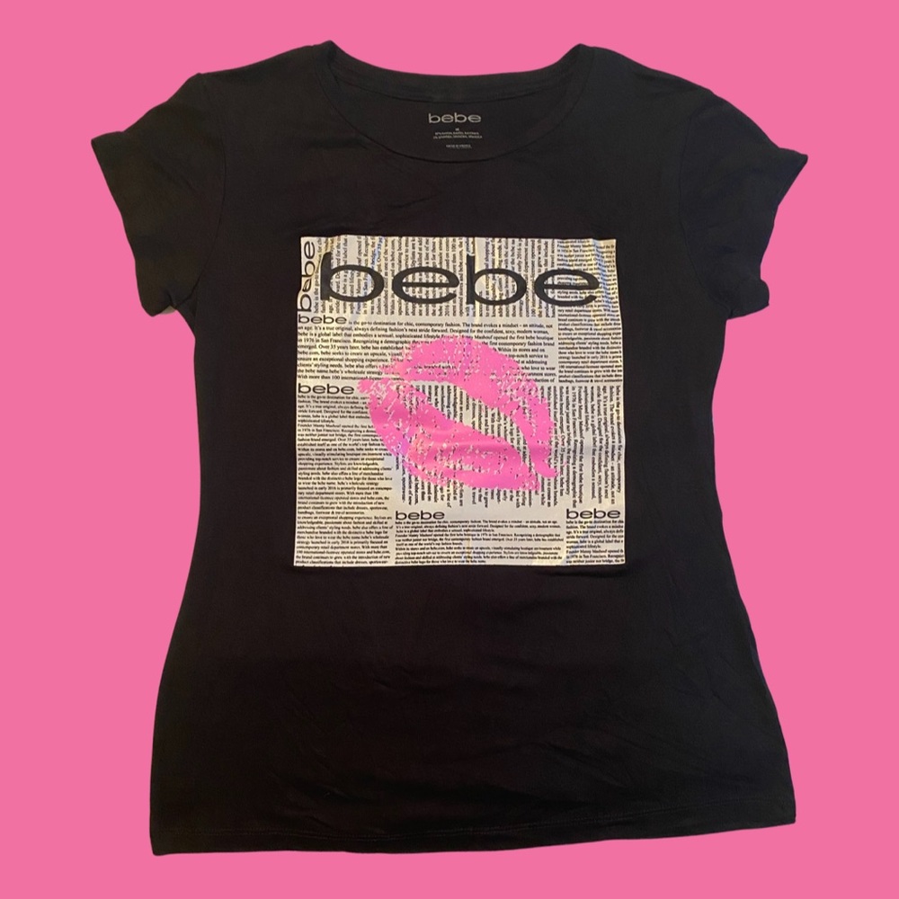 Cute stretchy BEBE T-shirt with black and white lettering and pink lips..